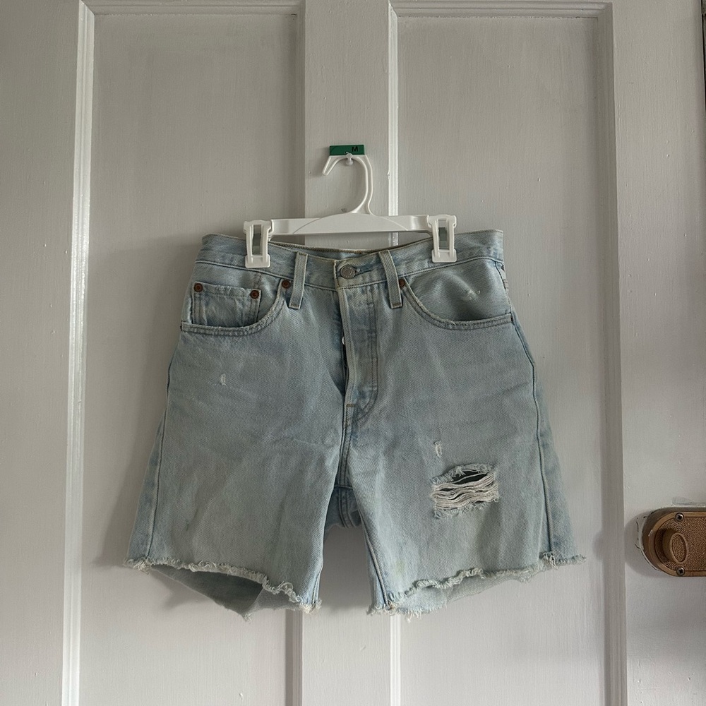 Ripped Levi Jeans Shorts with button up as zipper size medium